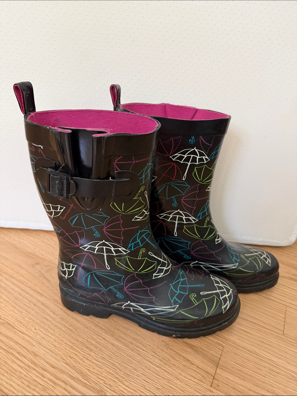 Capelli Women’s Black Umbrella Print Rain Boots with Pink Lining